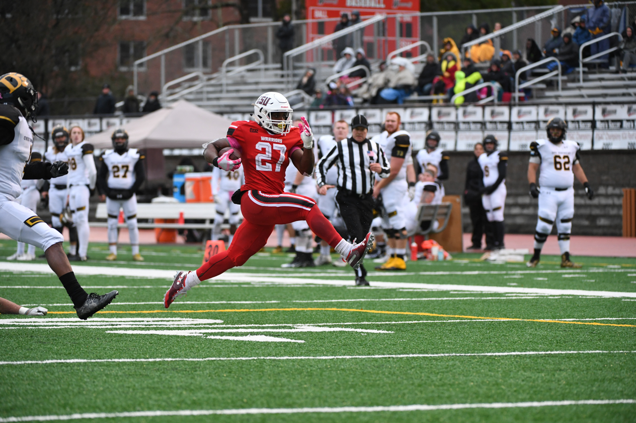 Devante Robinson high steps past Ohio Dominican defenders for a touchdown on Saturday afternoon in East Stroudsburg.