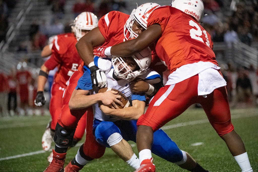 Thomas Jack Stephens fights for yardage against the Cardinals in Swiftwater on Friday, September 27, 2019.